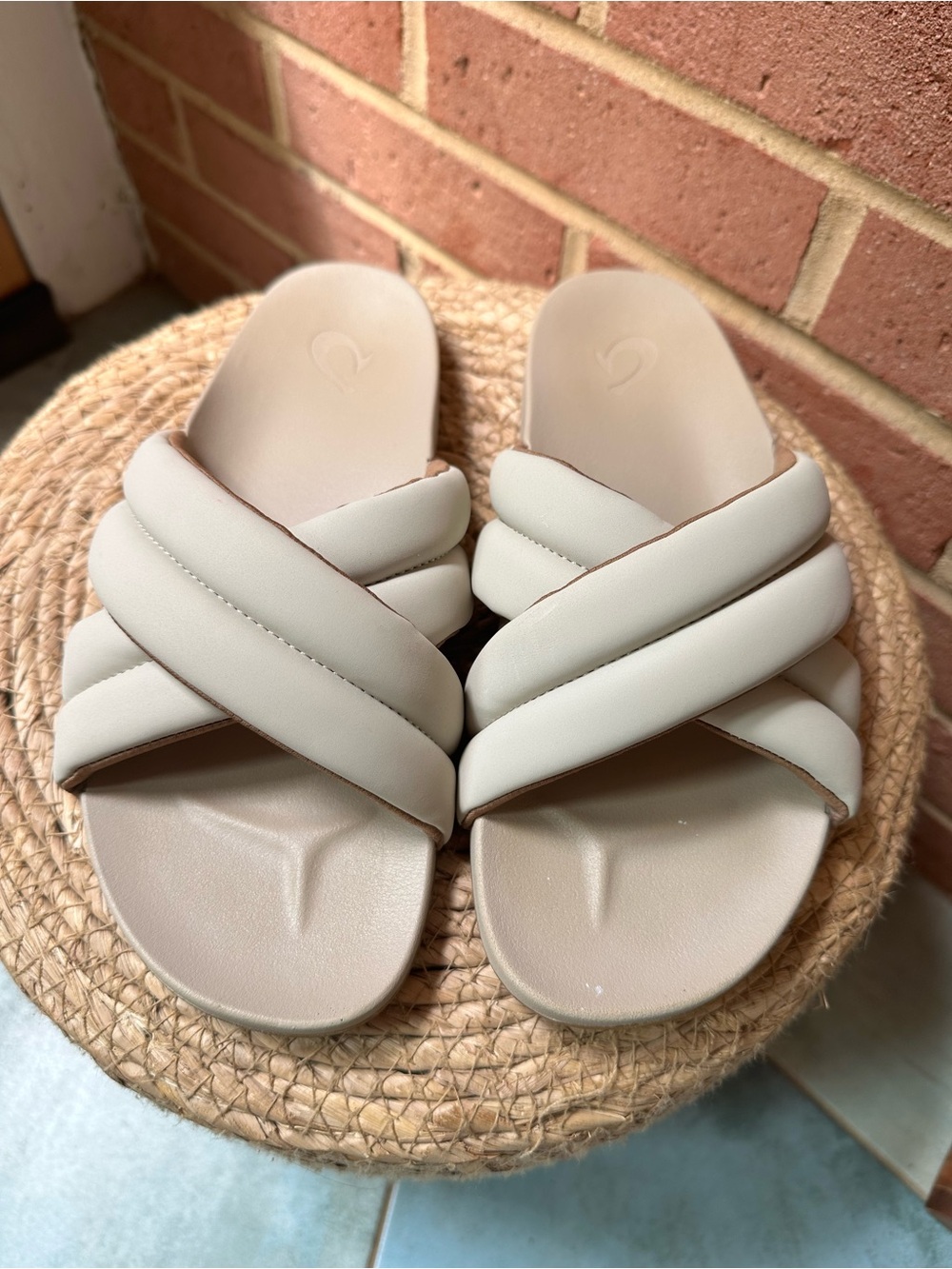 OluKai Quilted Crisscross Slide Sandals in Cream